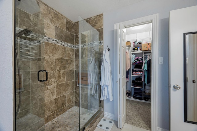 bathroom featuring an enclosed shower