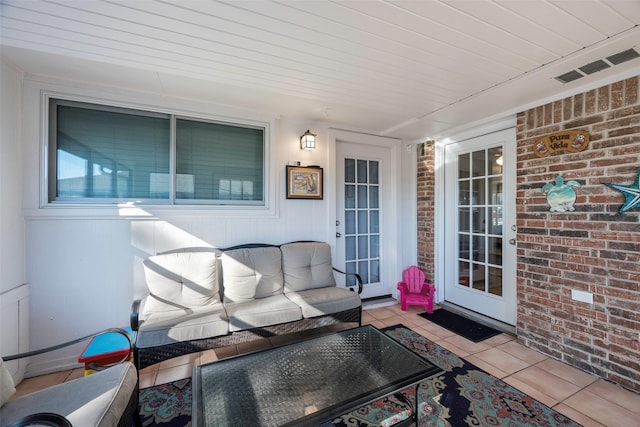 view of patio with a porch and outdoor lounge area