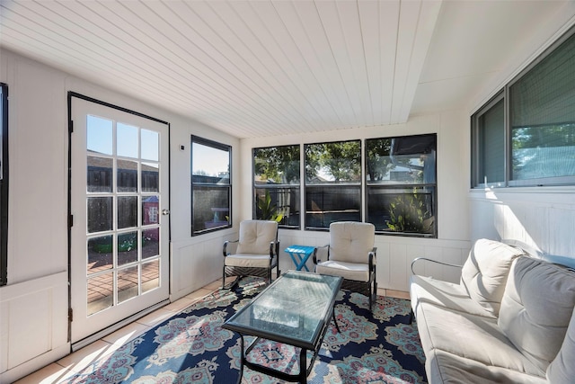 sunroom / solarium featuring wooden ceiling