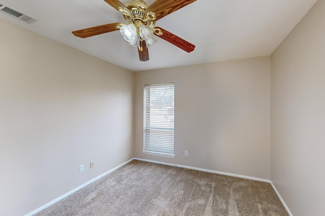 carpeted empty room with ceiling fan