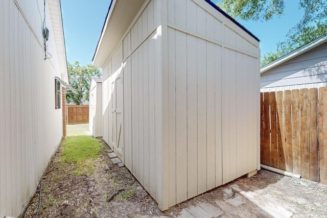 exterior space featuring a storage unit