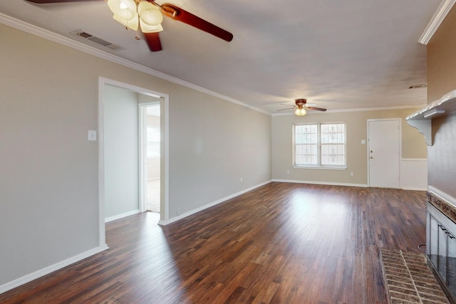 unfurnished living room with crown molding, a fireplace, ceiling fan, and dark hardwood / wood-style floors