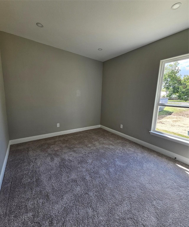 view of carpeted spare room