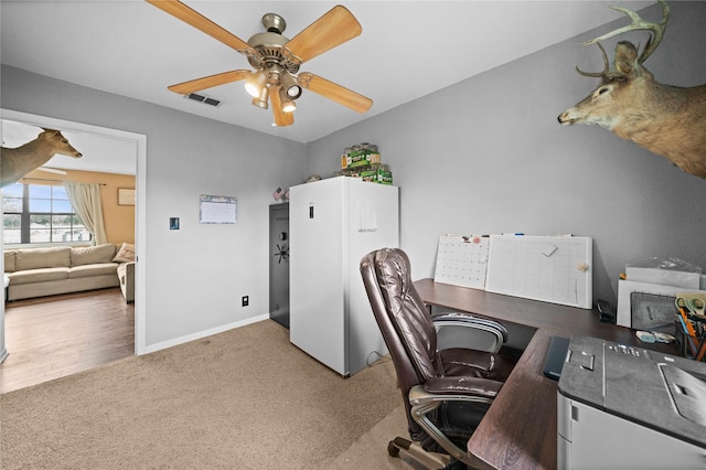 office featuring carpet flooring and ceiling fan