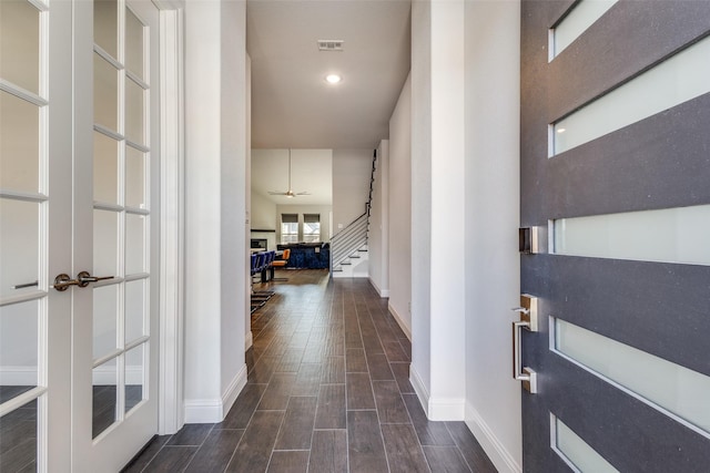 foyer with ceiling fan