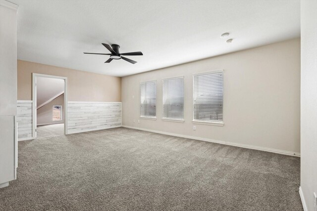 bonus room with carpet and lofted ceiling