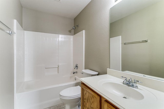 full bathroom with tile patterned floors, vanity, shower / bathtub combination, and toilet