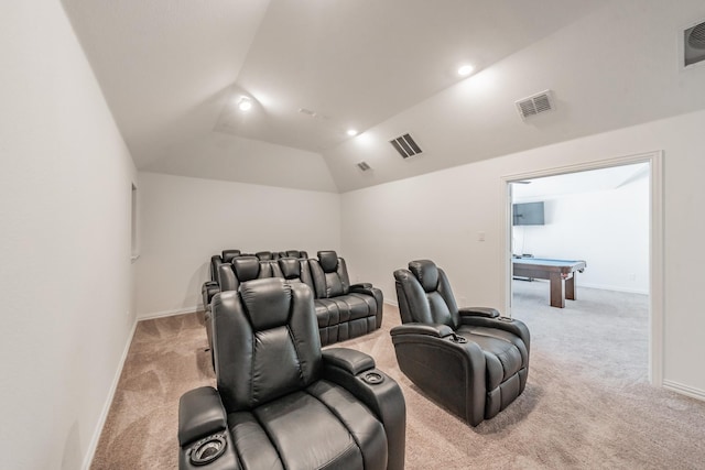 carpeted cinema with vaulted ceiling and pool table