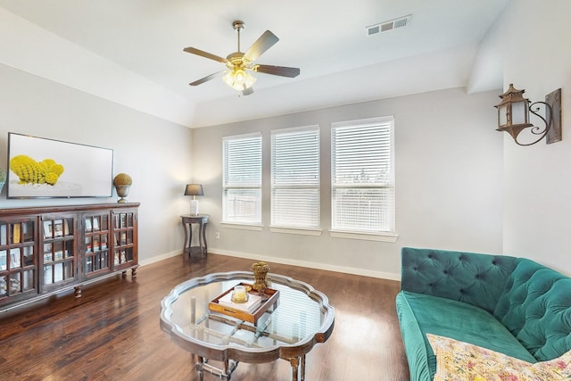 sitting room featuring ceiling fan, lofted ceiling, and dark hardwood / wood-style floors