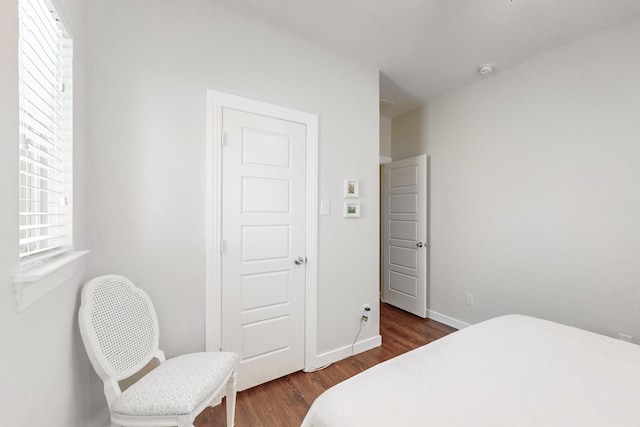 bedroom featuring dark hardwood / wood-style floors