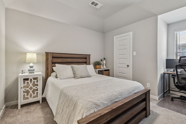 bedroom with light carpet