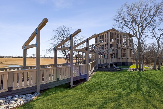 view of patio / terrace featuring a water view and an outdoor fire pit