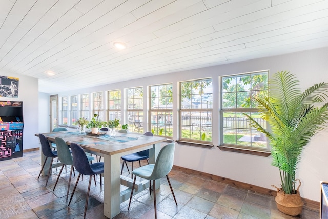 sunroom with wood ceiling