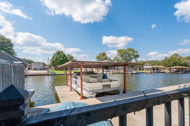 dock area featuring a water view