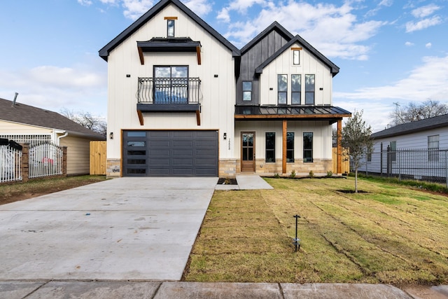 modern farmhouse style home with a balcony, a front lawn, and a garage