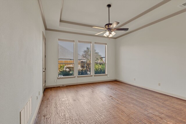 bedroom with multiple windows, ceiling fan, light carpet, and ornamental molding