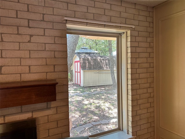 doorway with brick wall