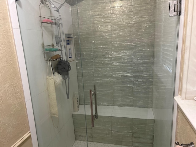 full bathroom with a shower stall