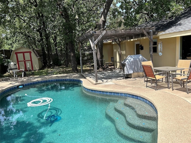 pool with a patio, an outdoor structure, a grill, a pergola, and a storage unit