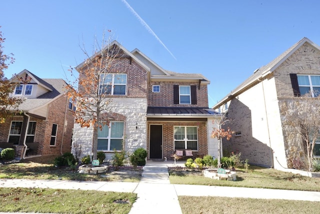 view of front facade with a front yard