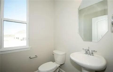 bathroom with sink and toilet