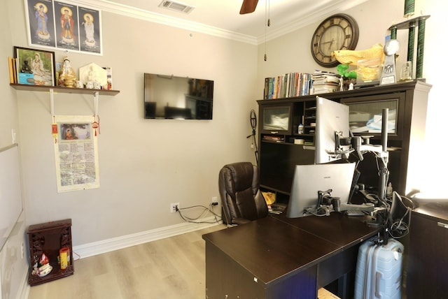 office area with crown molding, light hardwood / wood-style floors, and ceiling fan