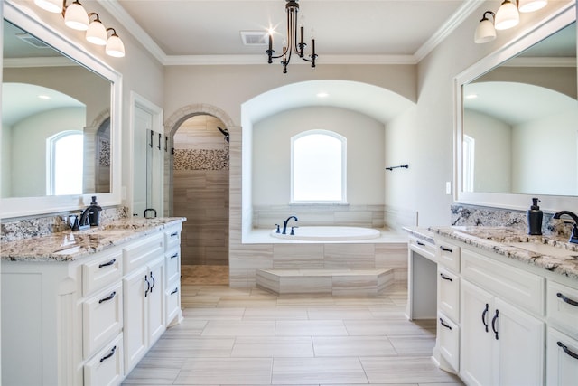 bathroom featuring independent shower and bath, crown molding, and vanity