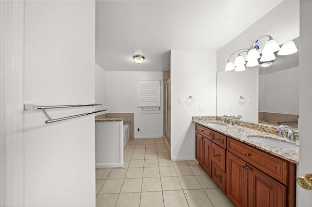 bathroom with tile patterned floors, vanity, and separate shower and tub