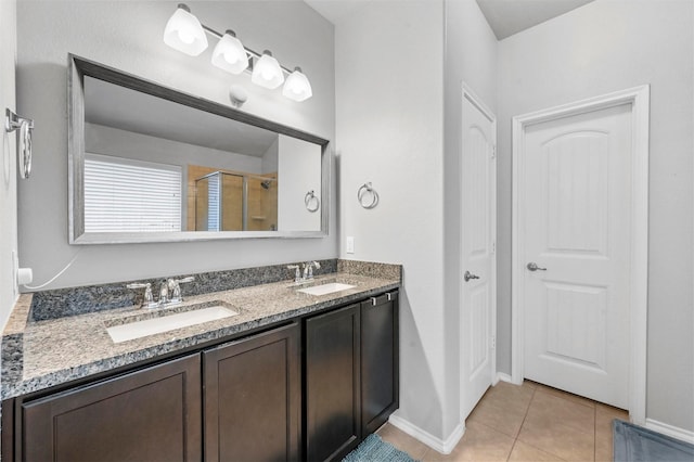 bathroom featuring vanity, tile patterned floors, and walk in shower