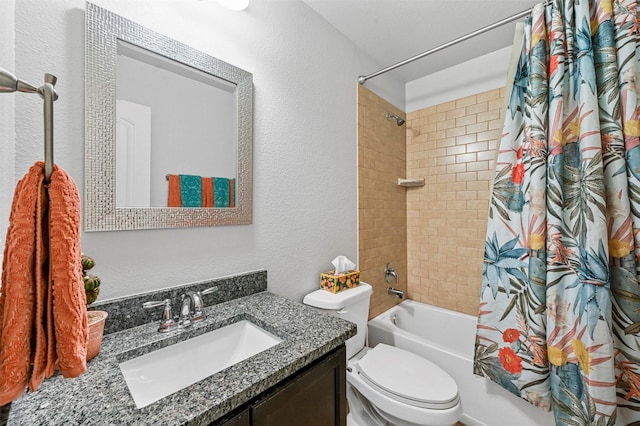 full bathroom featuring shower / bath combo, vanity, and toilet