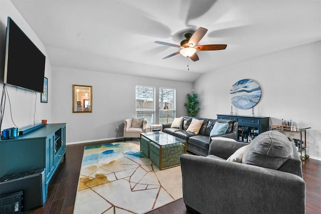 living room with hardwood / wood-style floors and ceiling fan