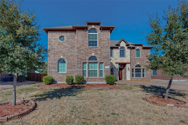 view of front of home with a front yard