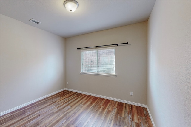 empty room featuring light hardwood / wood-style floors