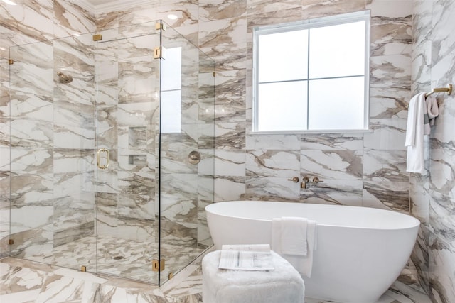 bathroom featuring separate shower and tub, plenty of natural light, and tile walls