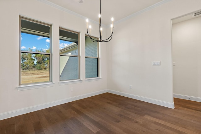 unfurnished dining area with crown molding, dark wood-type flooring, and a notable chandelier