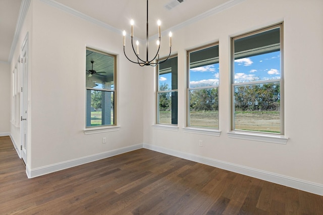 unfurnished dining area featuring dark hardwood / wood-style floors, ornamental molding, and ceiling fan with notable chandelier