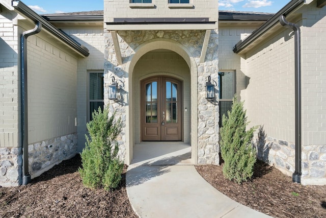 doorway to property with french doors