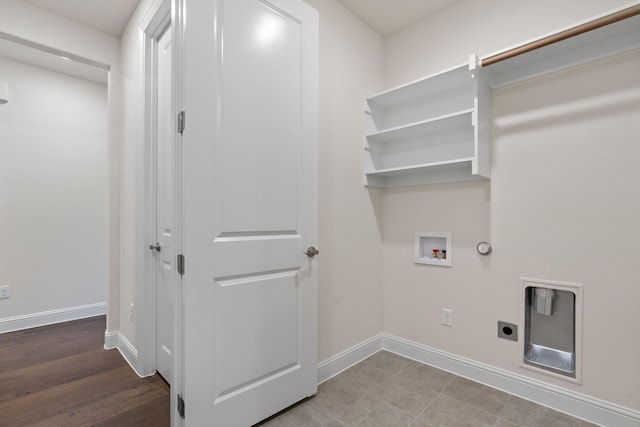 laundry room featuring gas dryer hookup, electric dryer hookup, and washer hookup