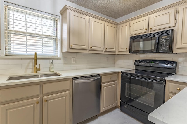 kitchen with decorative backsplash, a textured ceiling, sink, black appliances, and light tile patterned flooring