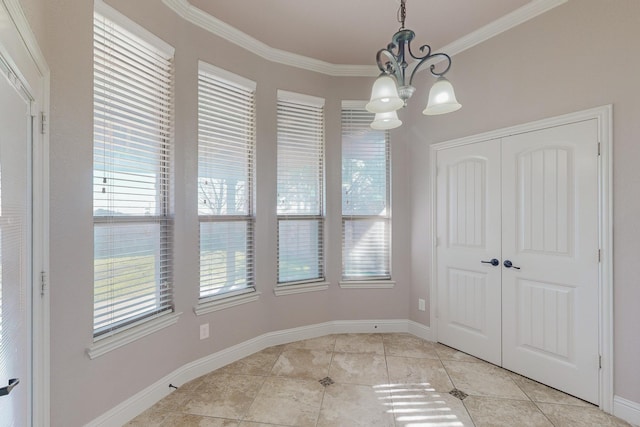 unfurnished dining area with a notable chandelier, light tile patterned floors, and crown molding