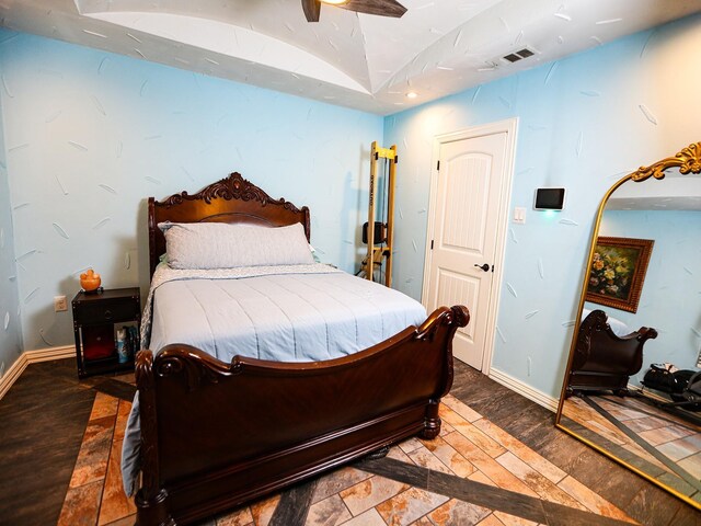 3905 Wayside Ave, Fort Worth, TX 76110 - bedroom with dark wood-type flooring and ceiling fan