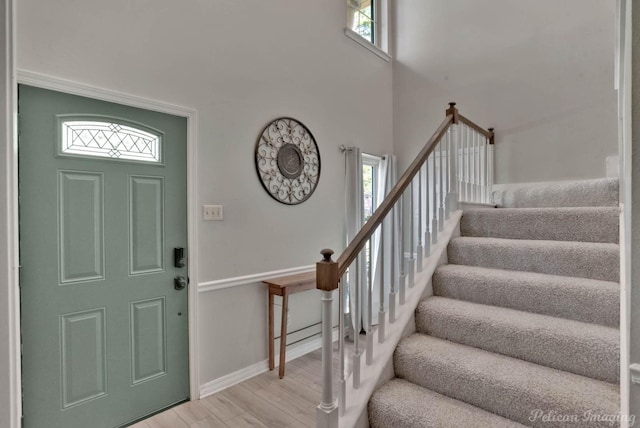 entryway with light hardwood / wood-style floors