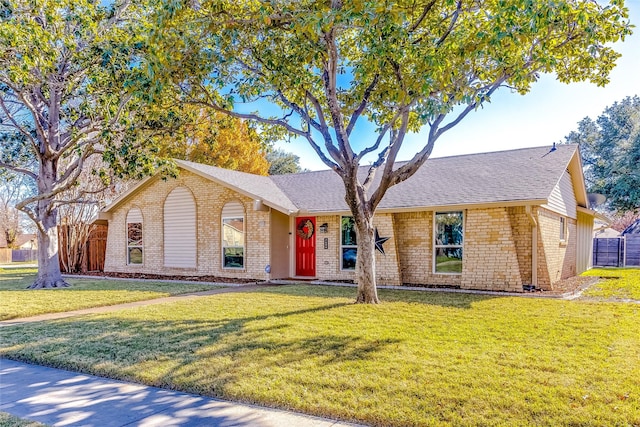 single story home with a front yard