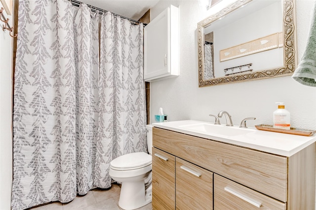 bathroom featuring walk in shower, tile patterned flooring, vanity, and toilet