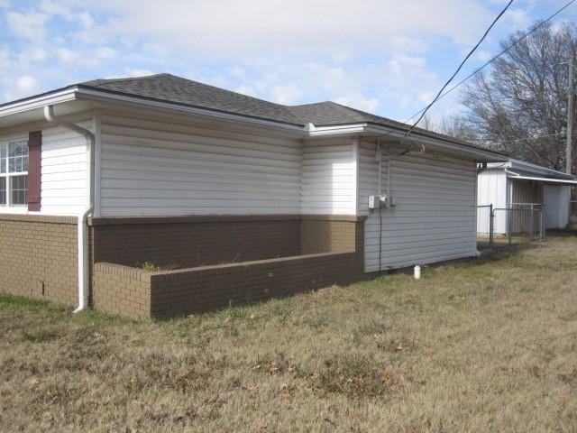 view of property exterior featuring a yard