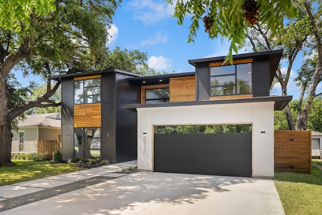 modern home featuring a garage