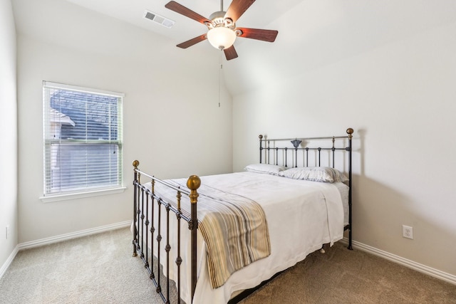 carpeted bedroom featuring ceiling fan and lofted ceiling