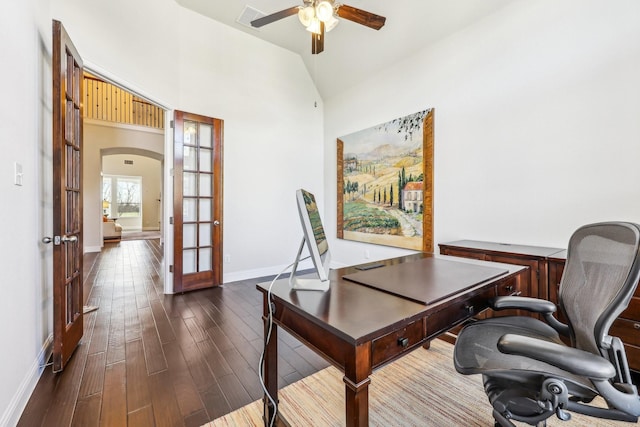 office space with dark hardwood / wood-style flooring, ceiling fan, french doors, and high vaulted ceiling