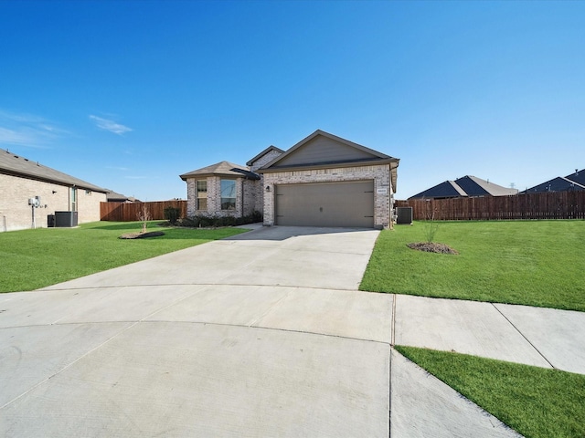 single story home featuring central AC unit, a front yard, and a garage