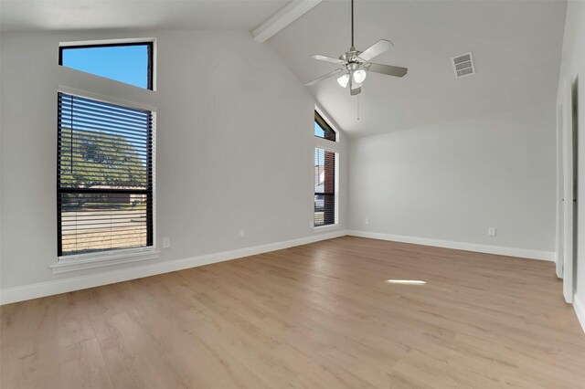 spare room with light colored carpet and ceiling fan